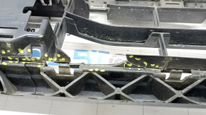The lower grille of the front bumper of the Audi Q3 83A 19-23 for parking sensors and radar, S-Line, is broken, cracked, a fragment is missing