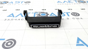 The emblem and inscription Quattro radiator grille of the Audi Q3 83A 19-25