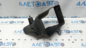 Left gearbox radiator deflector for a 1993 Honda Accord hybrid, broken mount