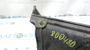 Left gearbox radiator deflector for a 1993 Honda Accord hybrid, broken mount