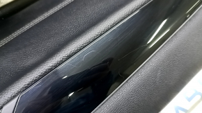 Black front left door panel for BMW X1 F48 16-22, black leather insert, black leather armrest, with handle, glossy black molding, with backlight, scratches on the molding