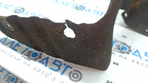 The rear right fender liner of a 2016-2017 Honda Accord has a torn mount.