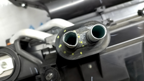 The heater assembly and air conditioner of a Honda Accord 17 hybrid have a dented pipe.