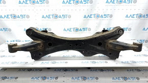 The rear subframe of a Mazda 6 18-21 is rusty.