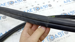 The front left door seal for BMW X1 F48 16-22 is worn out.