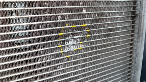 The water cooling radiator of the Hyundai Sonata 11-15 2.4 is dented