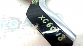 Volvo XC60 18-21 center console trim, glossy black with chrome, scratches