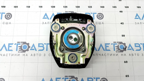 Black steering wheel airbag for the driver's side of a 1993 Honda Accord.