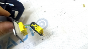 The Audi A3 8V 15-16 4D passenger seat belt tensioner has a broken connector.