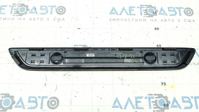 A set of black door sill plates for the Mazda CX-5 17-25 with a chrome insert and backlight, scratches