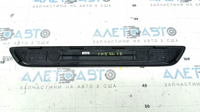 A set of black door sill plates for the Mazda CX-5 17-25 with a chrome insert and backlight, scratches