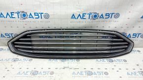 The grille assembly with frame for Ford Fusion mk5 2017-2018 is sand-painted and the mount is broken.