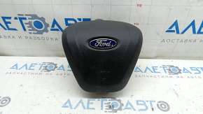 Black, scratched steering wheel airbag for the driver's side of a Ford Fusion mk5 17-20.