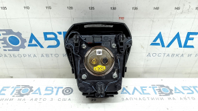 Black, scratched steering wheel airbag for the driver's side of a Ford Fusion mk5 17-20.