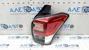 Right headlight for a 17-18 SJ Subaru Forester with wiring, broken glass, and a defective reflector.