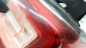 Right headlight for a 17-18 SJ Subaru Forester with wiring, broken glass, and a defective reflector.