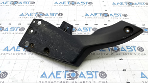 The right rear bumper lip of a Toyota Prius 30 10-15 is worn out.