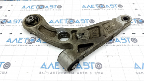 The lower front left control arm of a Jeep Cherokee KL 20-23 has a torn silent block.