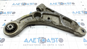 The lower front left control arm of a Jeep Cherokee KL 20-23 has a torn silent block.