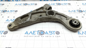 The lower front right control arm of a Jeep Cherokee KL 20-23 has a torn silent block.