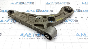The lower front right control arm of a Jeep Cherokee KL 20-23 has a torn silent block.