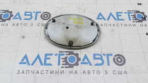 The Toyota Prius 30 10-15 trunk door emblem has peeled off the chrome.