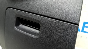 Black dashboard trim panel for the driver's knees of a VW Tiguan 18-24, with a trim panel, scratches