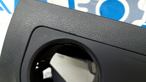 Black dashboard trim panel for the driver's knees of a VW Tiguan 18-24, with a trim panel, scratches
