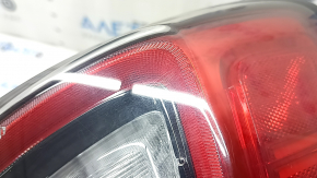 Left outer fender light for a Jeep Cherokee KL 19-23, with scratches.
