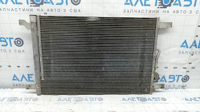 The air conditioning radiator condenser of the VW Tiguan 18-24 Keihin is dented, bent, and the honeycombs are falling out.
