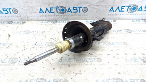 Rusty front left shock absorber for a 1995 Subaru Legacy