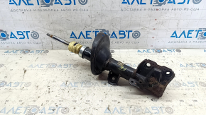 Rusty front right shock absorber for a 1995 Subaru Legacy
