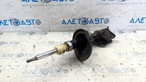 Rusty front right shock absorber for a 1995 Subaru Legacy