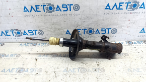 Rusty front right shock absorber for a 1995 Subaru Legacy