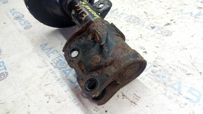 Rusty front right shock absorber for a 1995 Subaru Legacy