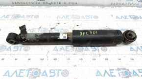 The rear right shock absorber of a Hyundai Santa FE Sport 17-18 restyling FWD is dented.