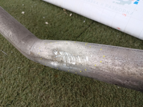 The exhaust line, middle part with a barrel, Jeep Grand Cherokee WL 23-25 3.6 long, under 1 exhaust, is dented, burst, the bracket is torn off.