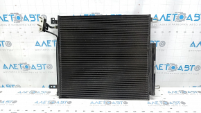The air conditioning condenser radiator of the Jeep Grand Cherokee WL 21-25 long is dented.