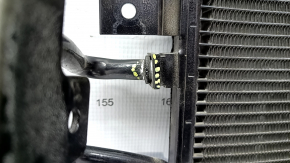 The air conditioning condenser radiator of the Jeep Grand Cherokee WL 21-25 long is dented.