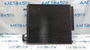 The air conditioning condenser radiator of the Jeep Grand Cherokee WL 21-25 long is dented.