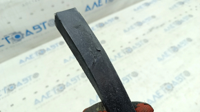 The front bumper lip of the Hyundai Santa FE Sport 13-18 type 2 is worn, the fastening is torn