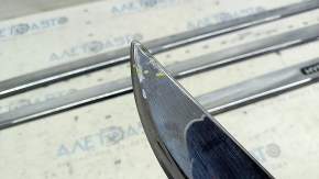 A set of lower door moldings for Toyota Prius 30 10-15 chrome, the chrome is swollen
