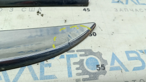 A set of lower door moldings for Toyota Prius 30 10-15 chrome, the chrome is swollen