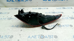 Mazda 3 19-22 4D outer wing light, left, micro cracks, needs polishing