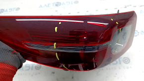 Mazda 3 19-22 4D outer wing light, left, micro cracks, needs polishing