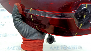 Mazda 3 19-22 4D outer wing light, left, micro cracks, needs polishing