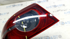 Mazda 3 19-22 4D outer wing light, left, micro cracks, needs polishing