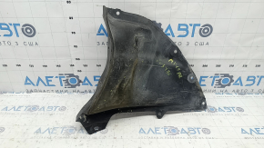 Right front bumper guard for Mazda 3 19-24 4d is torn and worn.