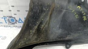 Right front bumper guard for Mazda 3 19-24 4d is torn and worn.