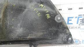 Right front bumper guard for Mazda 3 19-24 4d is torn and worn.